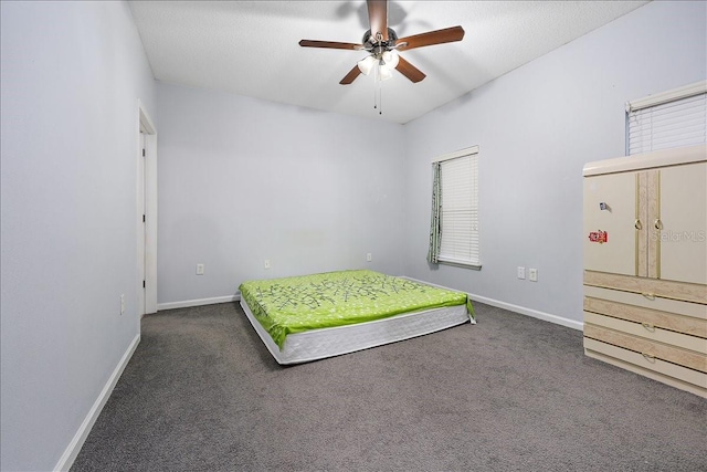 4998 Key Lime Dr Unit 103, Jacksonville, FL 32256 - carpeted bedroom featuring baseboards and a ceiling fan