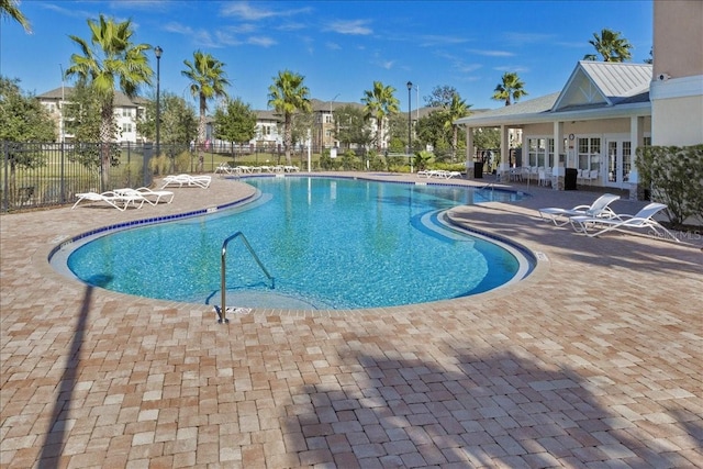 4998 Key Lime Dr Unit 103, Jacksonville, FL 32256 - community pool featuring a patio and french doors