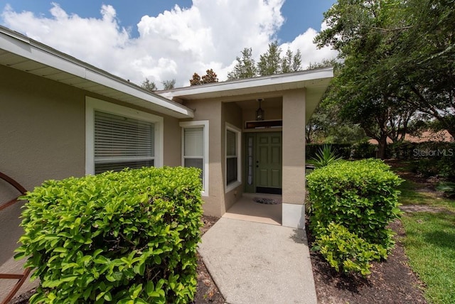 4228 Silver Star Dr, Spring Hill, FL 34609 - entrance to property featuring stucco siding