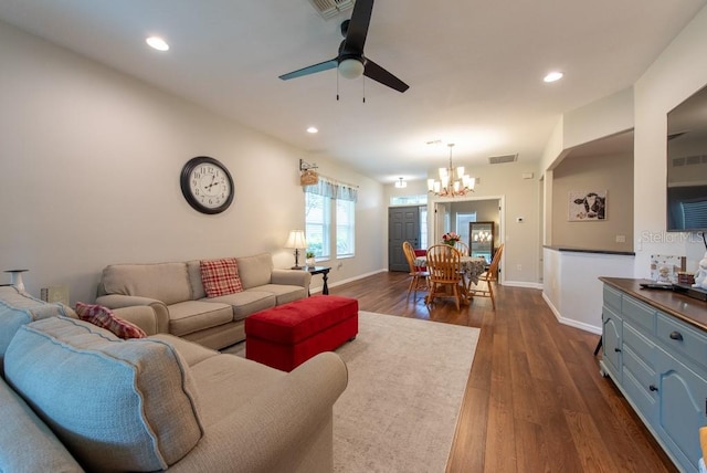 4228 Silver Star Dr, Spring Hill, FL 34609 - living area featuring a chandelier, ceiling fan, dark wood-type flooring, recessed lighting, and baseboards