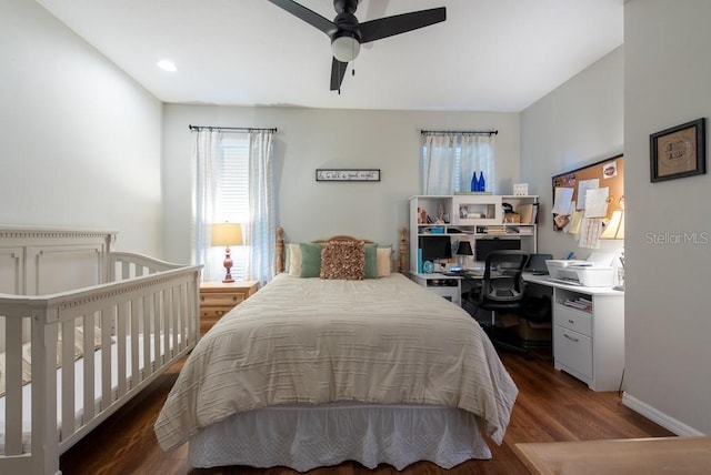 4228 Silver Star Dr, Spring Hill, FL 34609 - bedroom with wood finished floors, a desk, ceiling fan, and baseboards