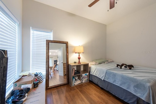 4228 Silver Star Dr, Spring Hill, FL 34609 - bedroom featuring wood finished floors, a ceiling fan, and lofted ceiling
