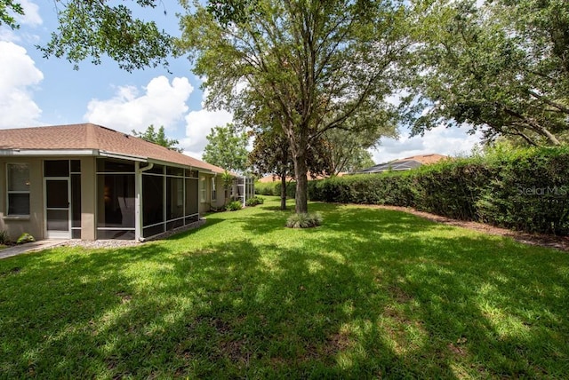 4228 Silver Star Dr, Spring Hill, FL 34609 - view of green lawn featuring a sunroom