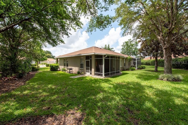 4228 Silver Star Dr, Spring Hill, FL 34609 - view of grassy yard featuring a sunroom
