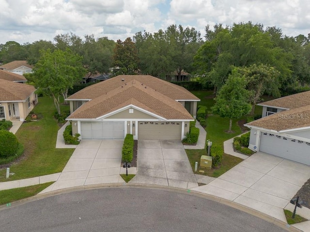 4228 Silver Star Dr, Spring Hill, FL 34609 - view of front of property featuring concrete driveway, a front yard, and stucco siding