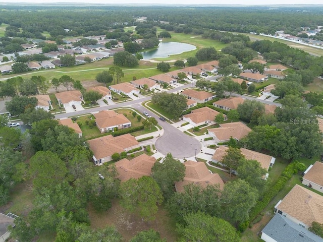 4228 Silver Star Dr, Spring Hill, FL 34609 - aerial view of property's location featuring a large body of water and nearby suburban area