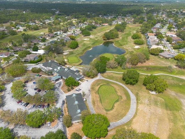 4228 Silver Star Dr, Spring Hill, FL 34609 - aerial overview of property's location with nearby suburban area, a nearby body of water, and a local golf course