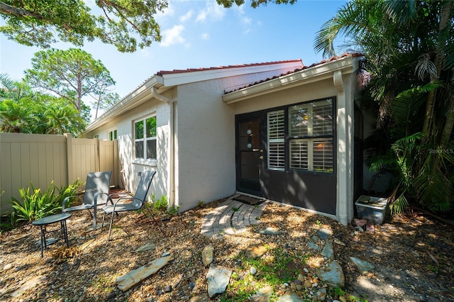 4783 Palermo Ct NE, Saint Petersburg, FL 33703 - rear view of house featuring stucco siding
