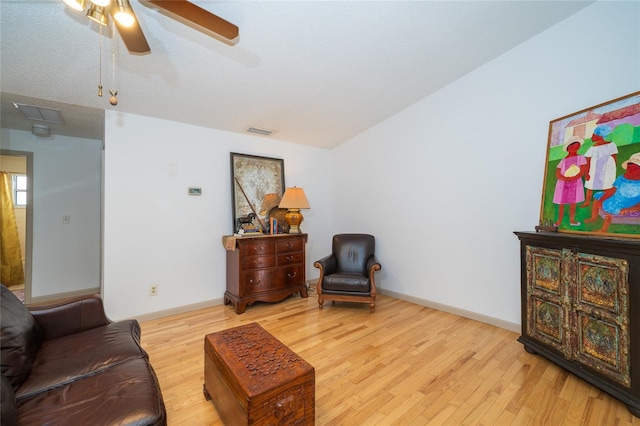 4783 Palermo Ct NE, Saint Petersburg, FL 33703 - living area featuring wood finished floors and a ceiling fan