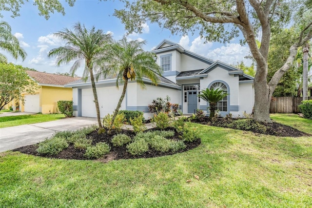 9806 Bennington Dr, Tampa, FL 33626 - view of front facade featuring stucco siding, concrete driveway, and a garage
