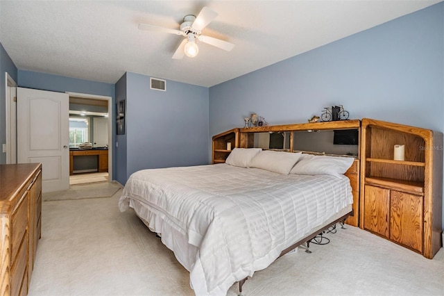 9806 Bennington Dr, Tampa, FL 33626 - bedroom featuring light colored carpet and ceiling fan