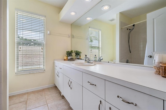 9806 Bennington Dr, Tampa, FL 33626 - full bathroom featuring vanity, toilet, a shower, baseboards, and tile patterned floors