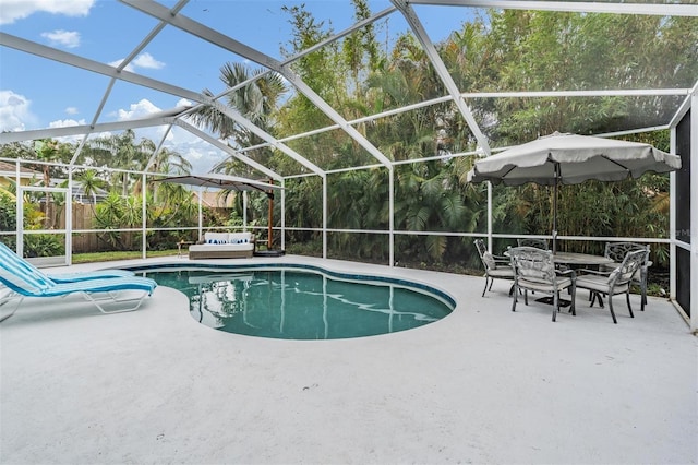 9806 Bennington Dr, Tampa, FL 33626 - swimming pool featuring a patio area and glass enclosure