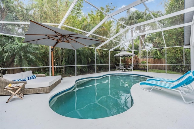 9806 Bennington Dr, Tampa, FL 33626 - view of pool with a patio, a fenced backyard, and a lanai