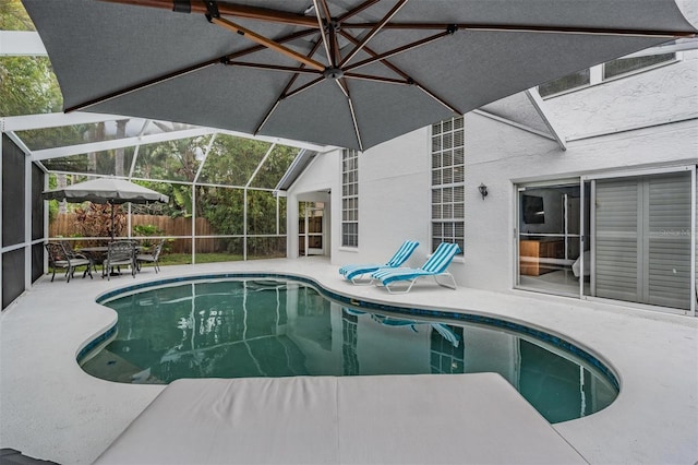 9806 Bennington Dr, Tampa, FL 33626 - view of swimming pool with a patio area and glass enclosure