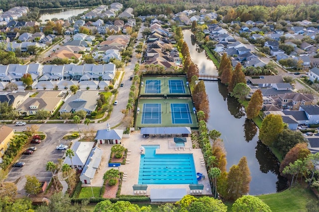 9806 Bennington Dr, Tampa, FL 33626 - view of property location with nearby suburban area, a large body of water, and a pool area