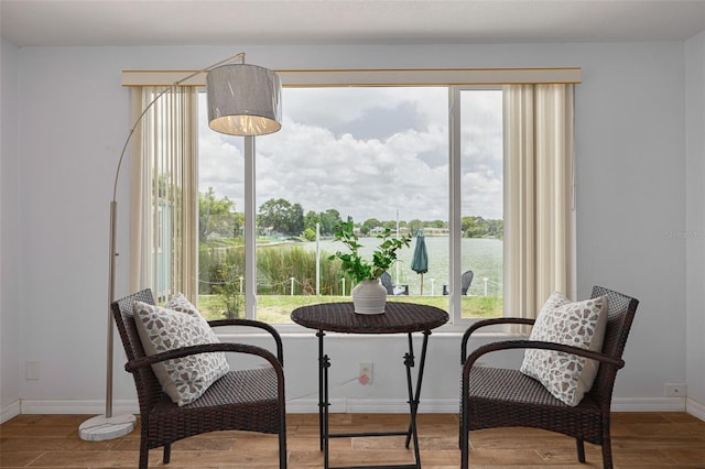8014 Lotus Dr, Port Richey, FL 34668 - dining space featuring wood finished floors and baseboards