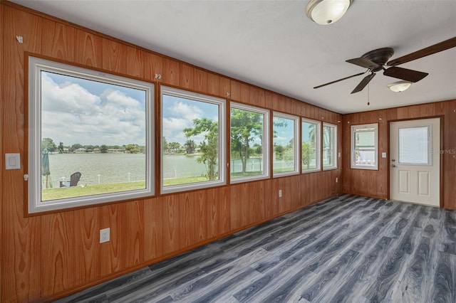 8014 Lotus Dr, Port Richey, FL 34668 - unfurnished sunroom featuring a water view