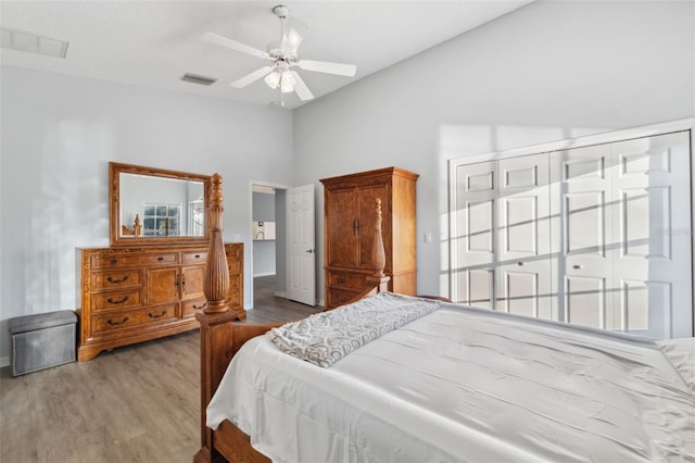 4411 Whitton Way, New Port Richey, FL 34653 - bedroom with vaulted ceiling, wood finished floors, a ceiling fan, and baseboards