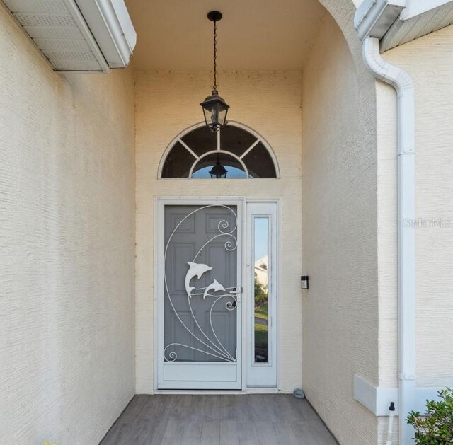 4411 Whitton Way, New Port Richey, FL 34653 - entrance to property featuring stucco siding