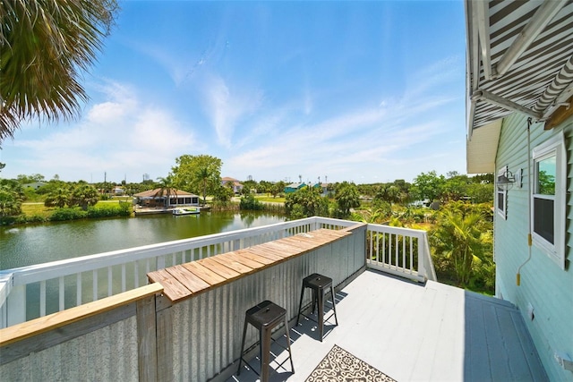3312 Holly Springs Dr, Hernando Beach, FL 34607 - balcony featuring a deck with water view