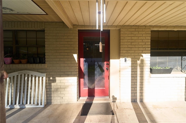 18121 Geraci Rd, Lutz, FL 33548 - property entrance featuring brick siding and covered porch