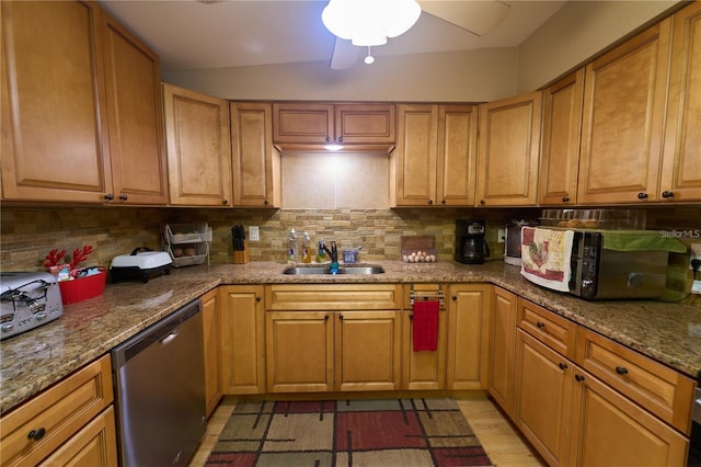 18121 Geraci Rd, Lutz, FL 33548 - kitchen with stainless steel dishwasher, a sink, white microwave, and decorative backsplash