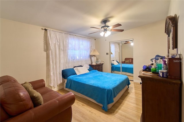 18121 Geraci Rd, Lutz, FL 33548 - bedroom featuring light wood-style flooring and a ceiling fan
