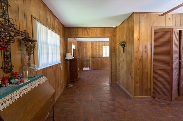 18121 Geraci Rd, Lutz, FL 33548 - corridor with wood walls and baseboards