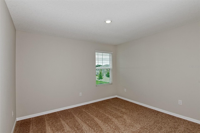 1221 Tidal St, Haines City, FL 33844 - carpeted spare room with baseboards