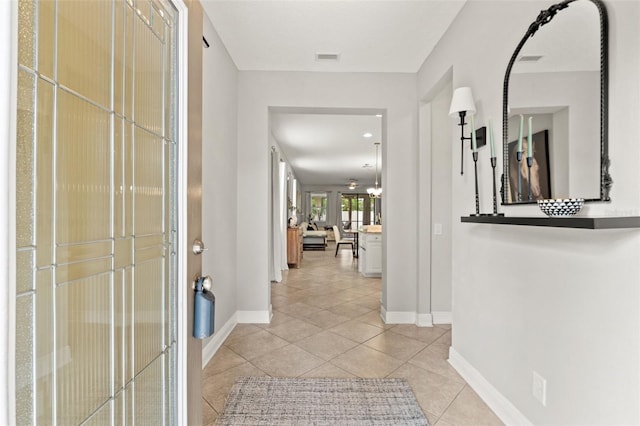 18620 Rococo Rd, Spring Hill, FL 34610 - foyer entrance featuring baseboards and light tile patterned flooring