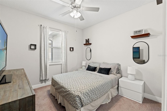 18620 Rococo Rd, Spring Hill, FL 34610 - bedroom with carpet, baseboards, and a ceiling fan