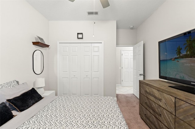 18620 Rococo Rd, Spring Hill, FL 34610 - carpeted bedroom with a closet and ceiling fan