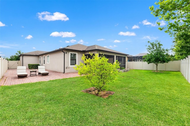 18620 Rococo Rd, Spring Hill, FL 34610 - rear view of property with a patio, stucco siding, and a sunroom