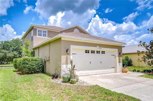 4227 Bethpage Ct, Wesley Chapel, FL 33543 - view of side of property featuring stucco siding, a yard, driveway, and an attached garage