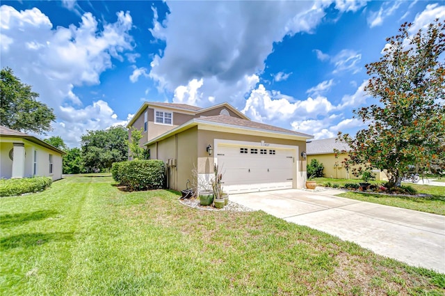 4227 Bethpage Ct, Wesley Chapel, FL 33543 - view of front facade with stucco siding, driveway, a front lawn, and an attached garage