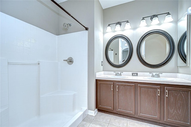 4227 Bethpage Ct, Wesley Chapel, FL 33543 - full bath with a tile shower, tile patterned floors, and double vanity