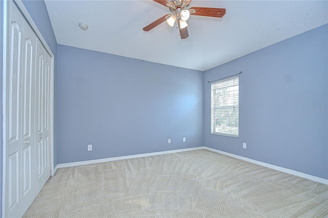 4227 Bethpage Ct, Wesley Chapel, FL 33543 - unfurnished bedroom with a closet, carpet, baseboards, and ceiling fan