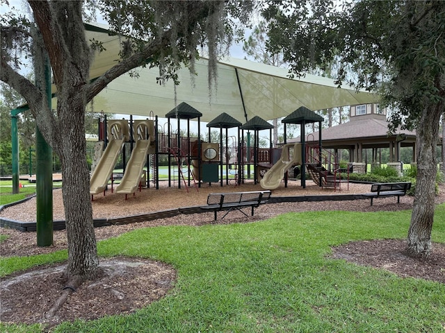 4227 Bethpage Ct, Wesley Chapel, FL 33543 - communal playground featuring a lawn
