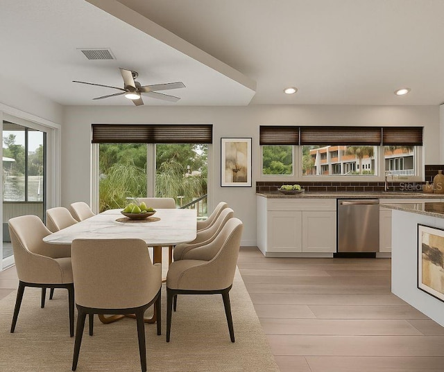 5264 S Spy Glass Pt, Homosassa, FL 34448 - dining area featuring light wood finished floors, ceiling fan, and recessed lighting