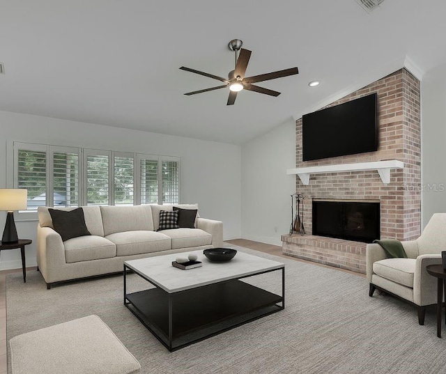 5264 S Spy Glass Pt, Homosassa, FL 34448 - living room with lofted ceiling, ceiling fan, a brick fireplace, and recessed lighting