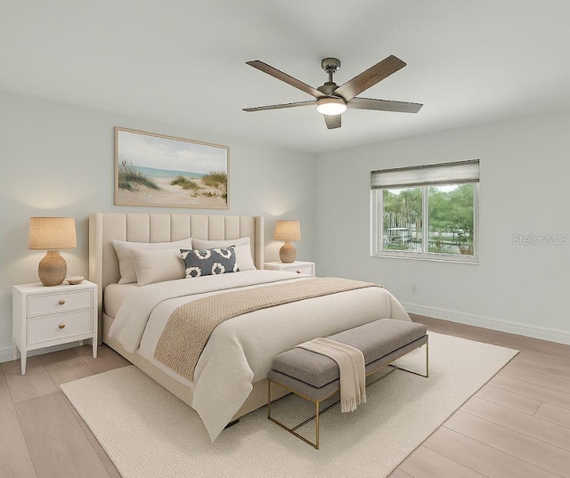 5264 S Spy Glass Pt, Homosassa, FL 34448 - bedroom with light wood-style floors and ceiling fan