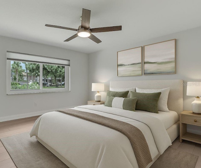5264 S Spy Glass Pt, Homosassa, FL 34448 - bedroom featuring ceiling fan and wood finished floors