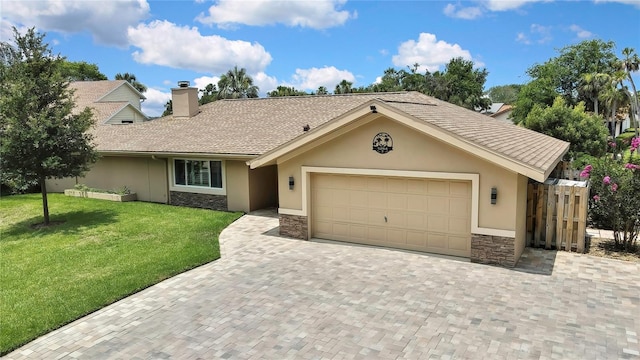 5264 S Spy Glass Pt, Homosassa, FL 34448 - single story home featuring stone siding, stucco siding, a garage, a front lawn, and decorative driveway