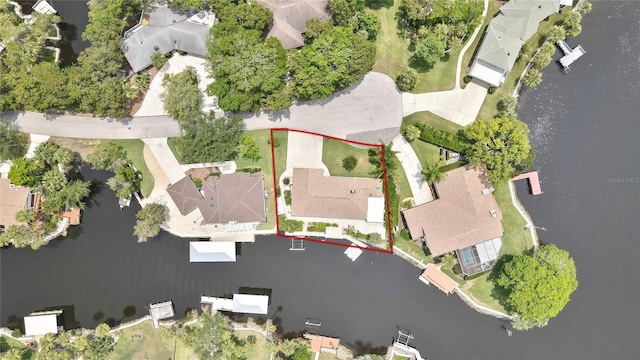 5264 S Spy Glass Pt, Homosassa, FL 34448 - aerial perspective of suburban area with property parcel outlined and a nearby body of water