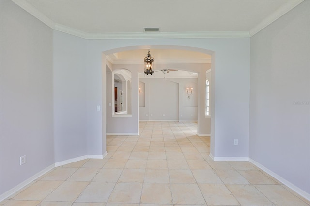 7114 Cromwell Park Ln, Apollo Beach, FL 33572 - empty room with ornamental molding, arched walkways, a chandelier, light tile patterned floors, and baseboards