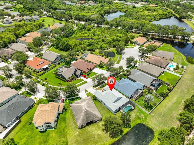 7114 Cromwell Park Ln, Apollo Beach, FL 33572 - aerial view of property's location with nearby suburban area and a large body of water