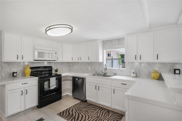 8356 W Tawny Rose, Crystal River, FL 34429 - kitchen with white microwave, black range with electric cooktop, dishwasher, a sink, and backsplash