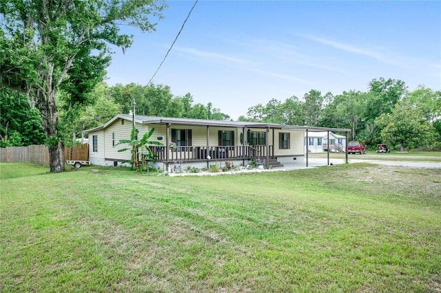 8356 W Tawny Rose, Crystal River, FL 34429 - manufactured / mobile home featuring covered porch, driveway, and an attached carport