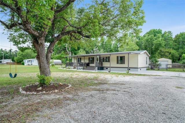 8356 W Tawny Rose, Crystal River, FL 34429 - view of front of property with a porch, driveway, crawl space, and view of wooded area